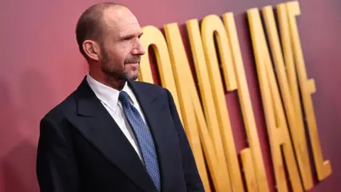 Getty Images Ralph Fiennes attends the "Conclave" Headline Gala during the 68th BFI London Film Festival at The Royal Festival Hall on October 10, 2024 in London, England