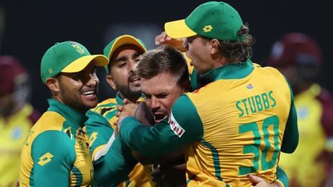 South Africa captain Aiden Markram celebrates a wicket with his team-mates during T20 World Cup