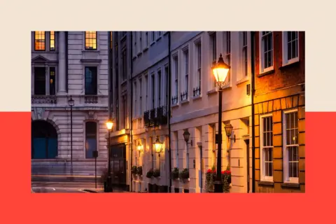 Getty Images St James's Place, London - street gas lights are illuminted in the early morning light