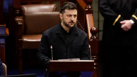 Maxwells/PA Handout photo issued by Maxwells of Ukrainian President Volodymyr Zelensky addresses a joint sitting of the Irish parliament in the Dail chamber on Tuesday afternoon during his visit to Ireland.