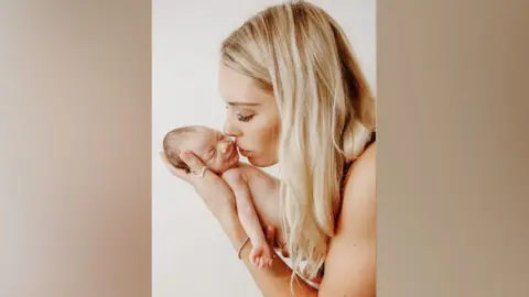 Gracie, who was born 10 weeks early, and her mother Mel Gray