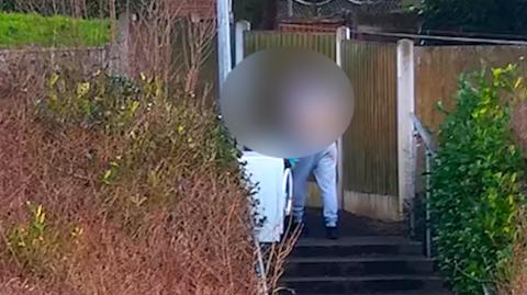 Man caught on CCTV dumping washing machine
