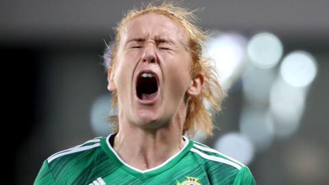 Rachel Furness screams on the pitch while playing for Northern Ireland