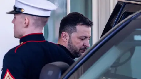 Reuters Ukrainian President Volodymyr Zelensky departs after a breakdown in negotiations with US President Donald Trump and a cancellation of the planned joint press conference at the White House in Washington, DC, USA, 28 February 2025