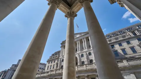 Bank of England building with pillars in the foreground.