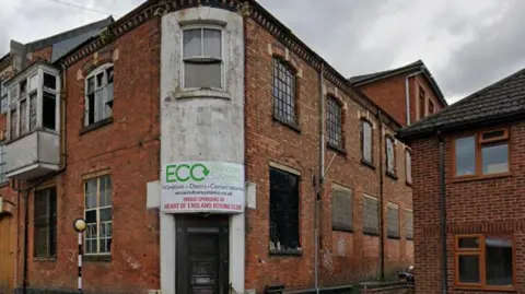 A streetview image of the Ghia Building. 