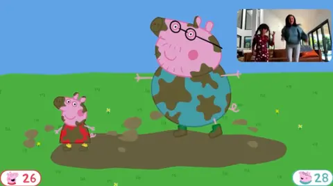 Nex Playground An in-game screenshot from the Nex Playground's Peppa Pig game, showing Peppa and Daddy Pig covered in mud, and an insert from two people jumping to it on camera. In the bottom corners are scores of 26 and 28.