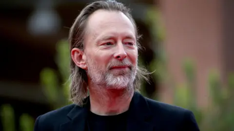 Getty Images Vocalist and songwriter of the rock band Radiohead Thom Yorke walks the red carpet during the 15th Rome Film Festival on October 24, 2020 in Rome, Italy