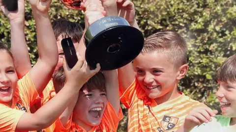 St Johns FC/Neil Frost St Johns under 10s celebrate winning the Suffolk Youth Football League