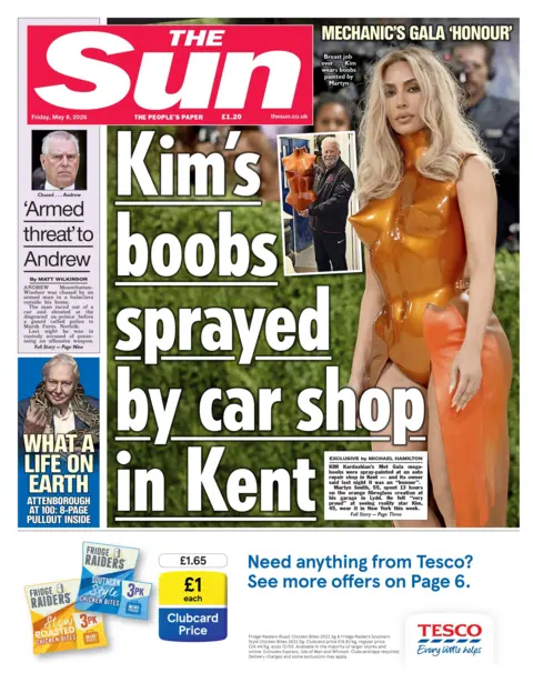 The headline on the front page of the Sun reads: “Kim's boobs sprayed by car shop in Kent”.