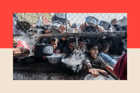 Anadalou/ Getty Images Displaced Palestinians receive food distributed by aid organisations
