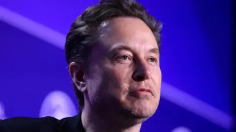 Headshot BBC Elon Musk dengan ekspresi serius 