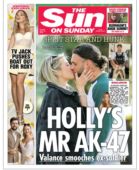 The headline on the front page of the Sun reads: "Holly's Mr AK-47."