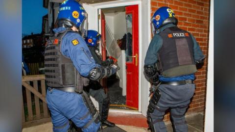  Police carry out drug raids at a property