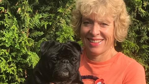 Sue Walker with her pug, Pete