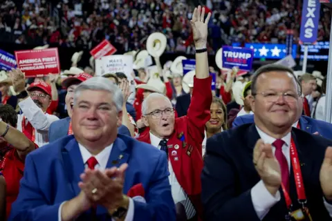 EPA A crowd of cheering Republican fans