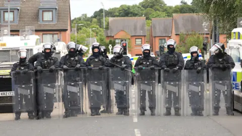 Line of PSNI officers at PA riot