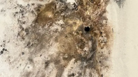 Tony & Becs Wadley Black mould on the wall of the Wadleys home. It spread throughout the house after internal wall insulation was badly installed. 