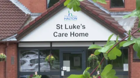 St Luke's care home in Runcorn is a red-brick building.