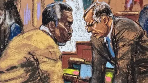 A court sketch shows Diddy, in a light tan top, huddled with his lawyer, Marc Agnifilo, who's wearing glasses and a brown suit.