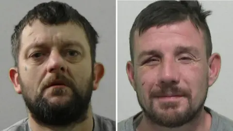 Mugshots of Brown and Robson. Brown has a dark beard and dark hear with a teardrop tattooed on his right cheek. Robson has a thinner dark beard and dark hair, has a cut on his face and his right eye is swollen