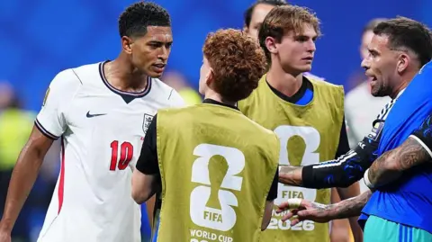 England's Jude Bellingham and Argentina's Valentin Barco 