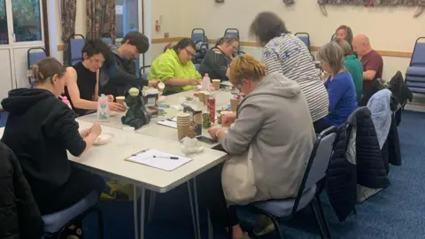 B Positive A group of people attending a B Positive session in Bedford