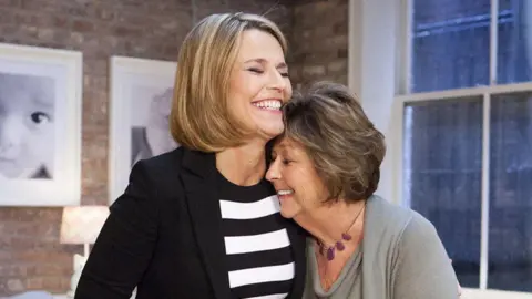 Savannah Guthrie (left) embraces her mother, Nancy Guthrie (right)