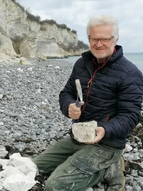 Laila Bennicke Fossil hunter Peter Bennicke at Stevns Cliff where he found the vomit fossil