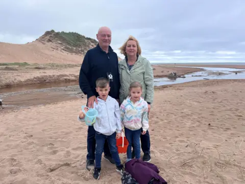 Lewis and Leah Poppe with their Grandparents