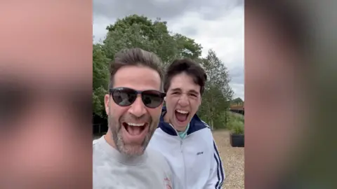 Gethin Jones and his nephew Alby played the 'train game' by the railway