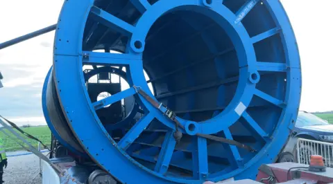 BBC A large reel containing a cable