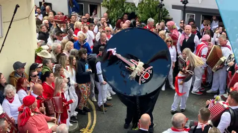 BBC The Obby Oss parade in Padstow, 2024