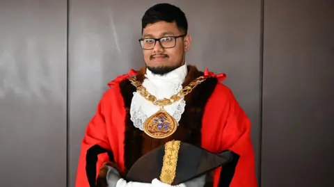 Sunderland City Council's first mayor of Asian descent, Ehthesham Haque wearing his ceremonial robes.

