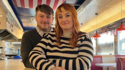 Supplied Cody and Luke Chedwynd inside an american diner restaurant