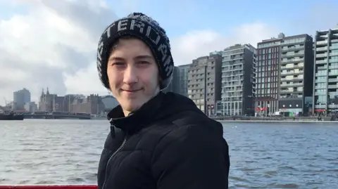 Liam on holiday in Amsterdam in 2016 before his diagnosis