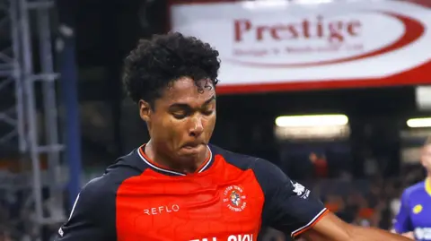 Reuell Walters in action for Luton Town