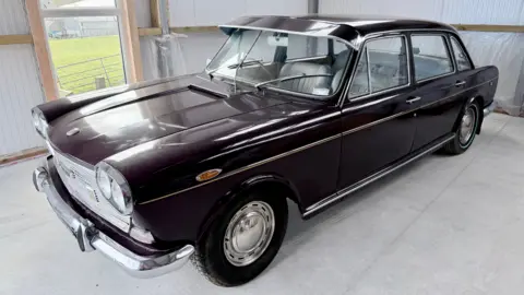 A mulberry coloured 1970 Austin 3 litre car