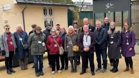 EMR People from Friends of Beeston Station volunteer group stood on Beeston Station platform