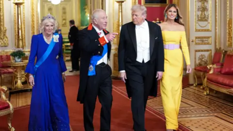 U.S. President Donald Trump and first lady Melania Trump participate in an official state banquet with King Charles III and Her Majesty Queen Camilla of the United Kingdom of Great Britain at Windsor Castle, in Windsor, Britain September. 17, 2025.