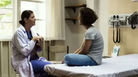 Getty Images Doctor and patient