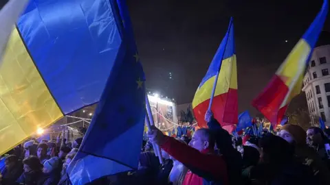 Romanians fly flags in the centre of Bucharest 