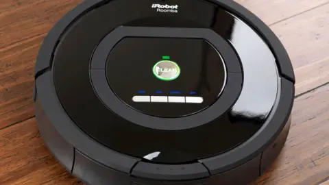 The irobot Roomba on wooden flooring