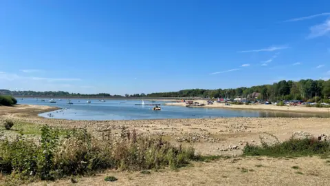 Carsington Water surrounded by brown, parched land