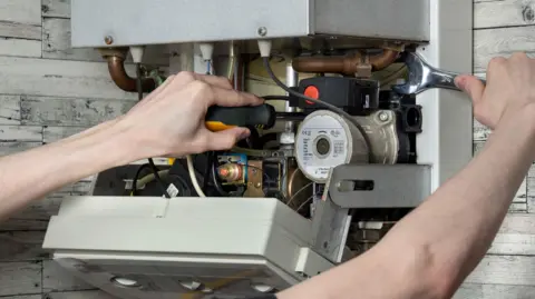 Generic image of a gas boiler being fitted.