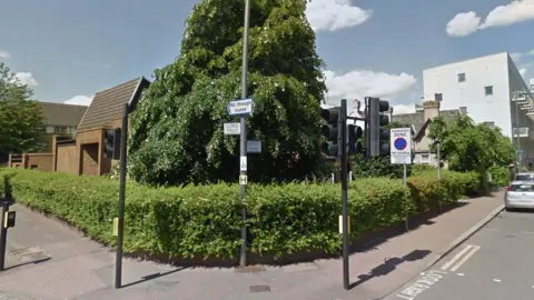 Google General view of a street corner with a street sign for Linton Road