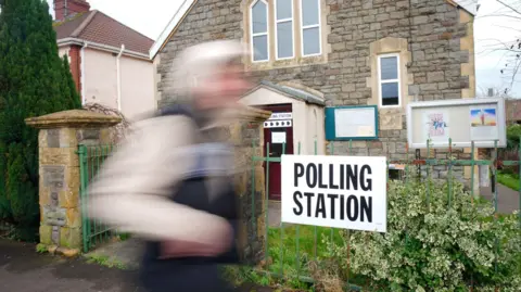 File photo dated 15/02/24 of a polling station in a church in Kingswood.
