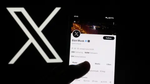 Elon Musk's X profile displayed on a phone