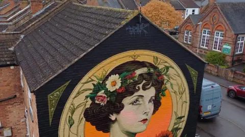 Art Friends Warwickshire A mural on a building