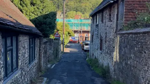 George Carden / BBC  The narrow road which leads to Southover Primary School in Lewes